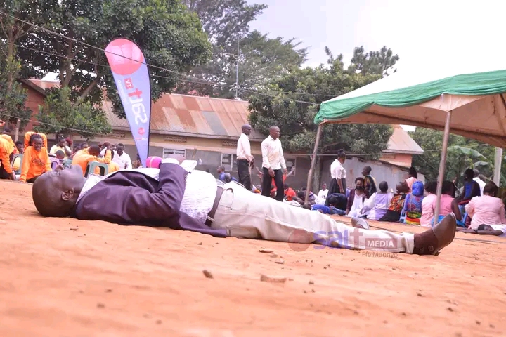 PHOTOS: Holy Spirit Strikes Pastor Bugingo Amidst Prayer Session, Sleeps On Floor